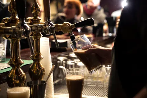 Bartender pouring drink